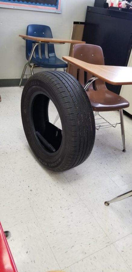 A student uses an old tire to carry belongings to class on Anything But A Backpack Day. Bremens student body came up with a lot of creative ideas to promote school spirit!