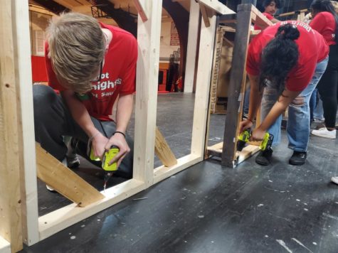 Members of Bremen Theaters Stage Crew work to build set pieces for the fall play Death of A Hot Sauce Salesman. The stage crew is responsible for ensuring the set is built and is placed appropriately on stage for each scene. 