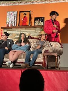 The cast of the fall play enjoys acting on stage at Friday nights performance of Death of A Hot Sauce Salesman