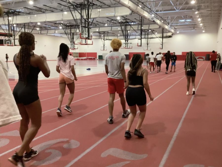 Track athletes prepare for the upcoming season in the field house on January 24th with Coach Griffin and Coach Verble. In order to remain in shape and prepare for the upcoming season, students interested in joining the track team spend the off season staying active.