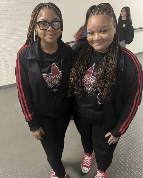 Juniors Nevaeh Terry and Bailee McFall pose for a picture before their first step performance during the 2023 basketball season.