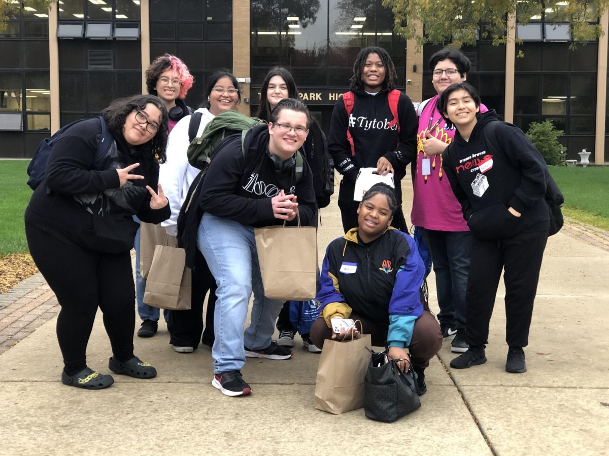 Bremens Echo newspaper and Arrow Yearbook staffs celebrate a successful SSC Publications Workshop on Friday, Oct. 27 at Tinley Park High School. The newspaper and yearbook members participated in a variety of sessions throughout the day to enhance their journalism skills. 