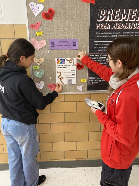 Freshmen GSA members Maya Contreras and Esperanza Anaya post flyers encouraging students to sign up to participate in the Day of (No) Silence on April 12. This day is a way for students to commit to not remaining silent when they witness harassment and discrimination against LGBTQ+ people in schools. At the end of the day on April 12, GSA will sponsor a pizza party in the IMC for students who want to participate. The cost of the pizza party is $1. Students and staff can also show support by purchasing T-Shirts $15. They will be on sale in the IMC from April 1 through April 11.