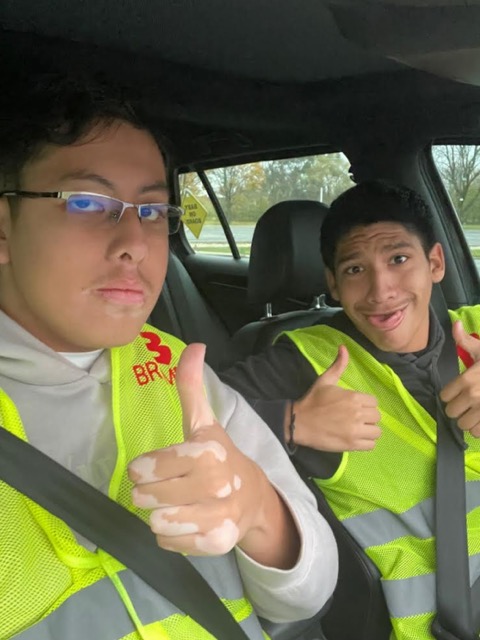 Seniors Said Rodriguez and Oscar Gonzalez head out to drop off food drive bags in the Midlothian community on Nov. 12. The bags allow people to leave the food they wanted to donate on their porches for student volunteers to collect the week of Nov. 18.