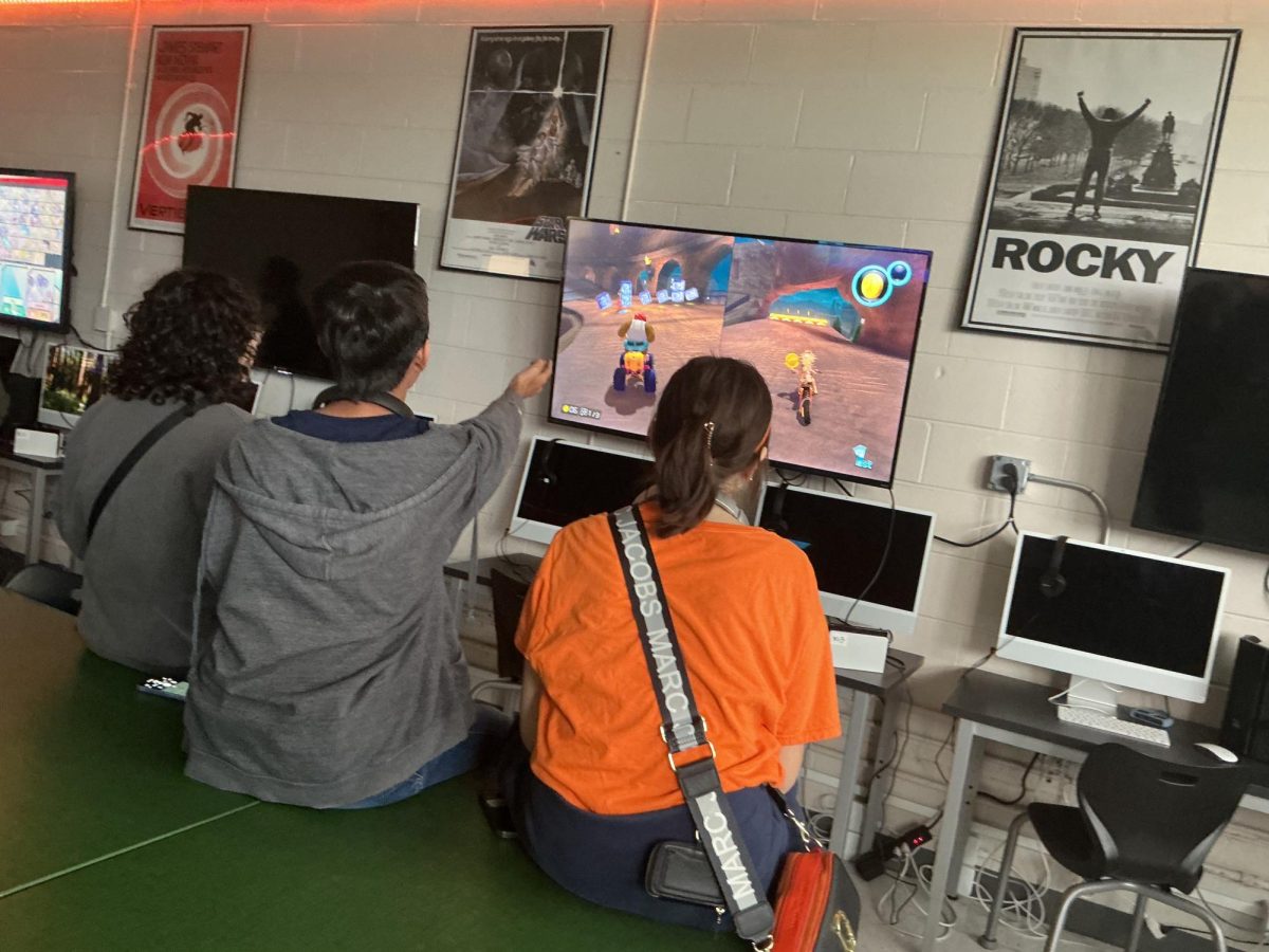 Freshmen eSports members Alexis Pena, Daniel Patino and Lily Garcia play Mario Kart Deluxe at the Oct. 21 eSports practice. Alexis took the lead and won first place!