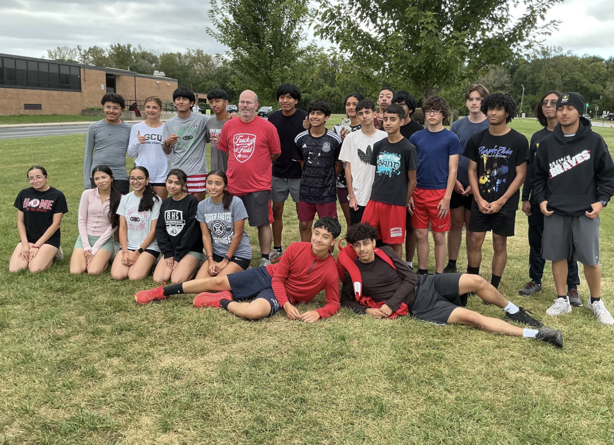 The BHS Cross Country Team warms up by the Bremen flagpole on Oct. 7. They were preparing for their next race on Oct. 10. Their final race of the regular season will be Oct. 18.