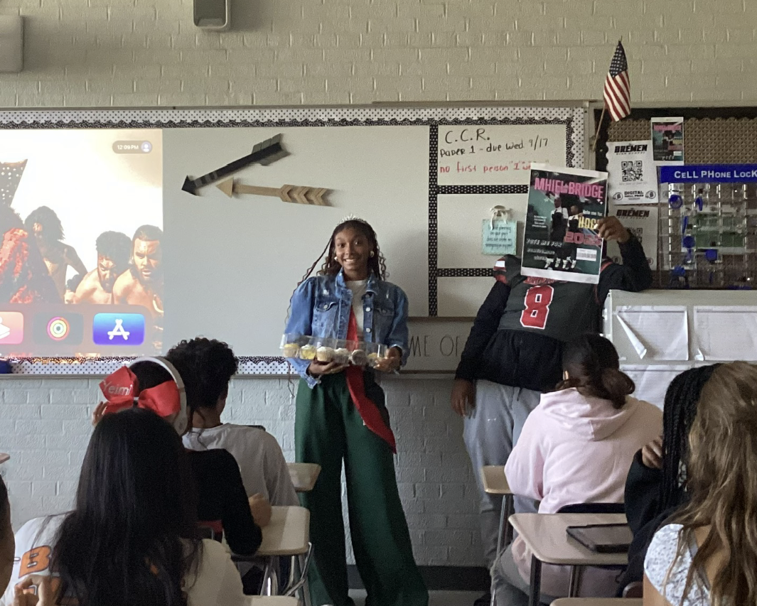 Senior Mhiel Bridge talks to Mrs. Dwyer's senior English class at the start of Homecoming week about why they should vote for her as this year's Homecoming Queen.  Bridge was crowned Bremen Homecoming Queen at the Homecoming Dance 2025. This year's theme was "There's No Place Like Home" and featured spirit days that incorporated ideas from the movie "The Wizard of Oz."