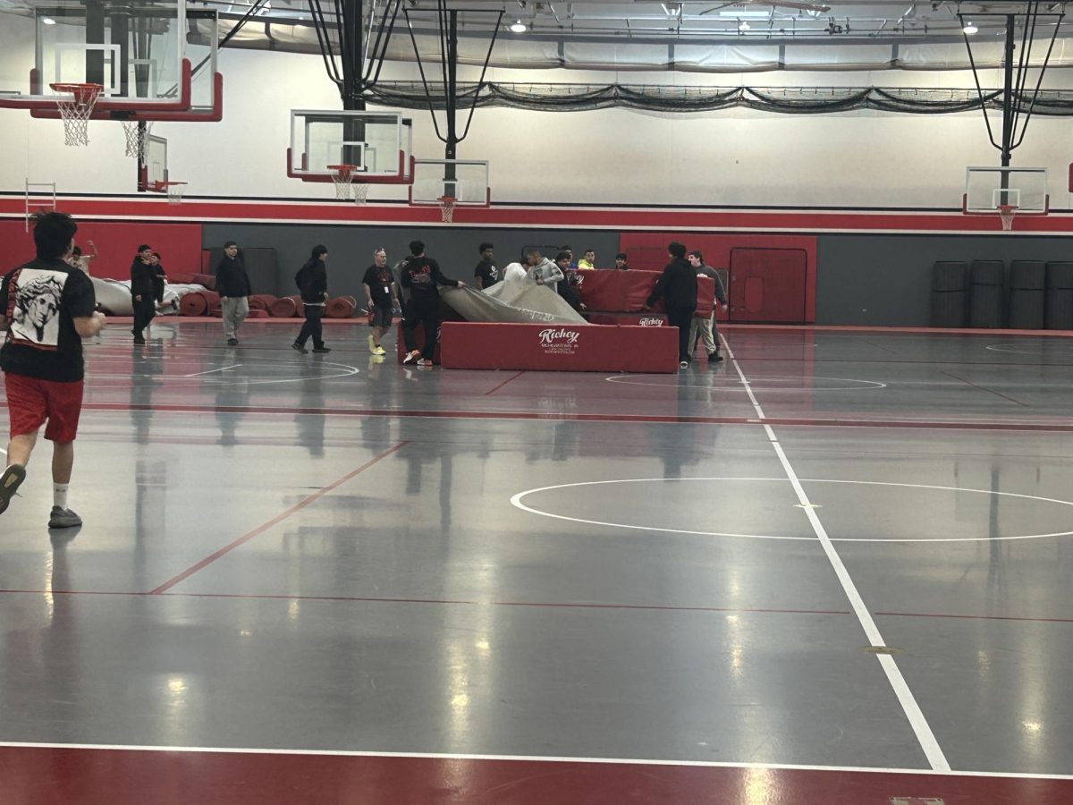 The 2026 Braves track team pulls out the mats for practice Feb. 10 in the field house. The indoor team participates in many of the same events as the outdoor events, but they avoid the inclement weather.