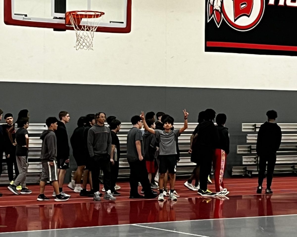 The Bremen Boys' Track team warms up March 31st. The team had to practice inside the Braves' Field House due to the rainy weather.  Regardless of the inside practice setting, the athletes work hard and prepare for wins at the upcoming meets!