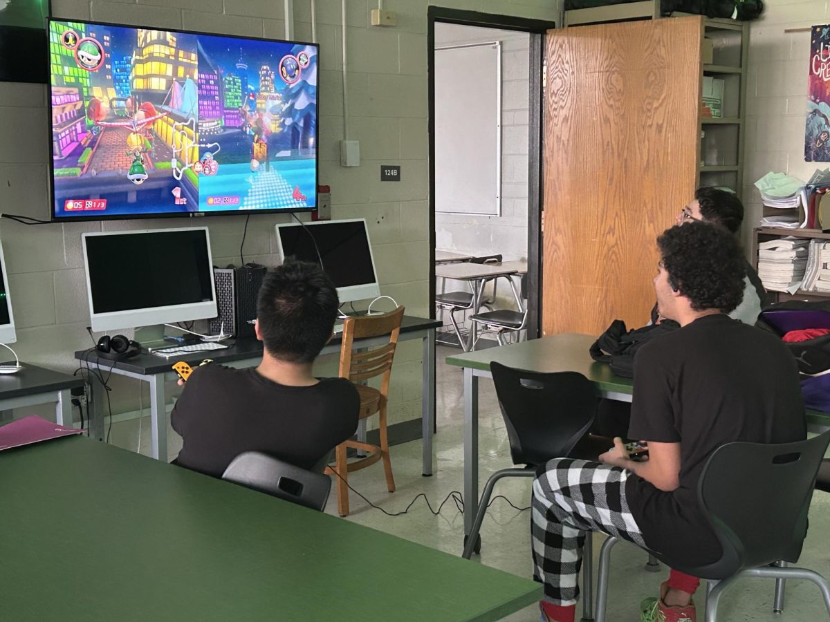 E sports Club members practice on enhancing their skills for their upcoming State Sectionals, scheduled for April 25. The games they will be playing in the competition are Super Smash Bros and Super Mario Kart. Club member Jared Mercado says, “This club is pretty cool, its my favorite club where I can improve my skills.”