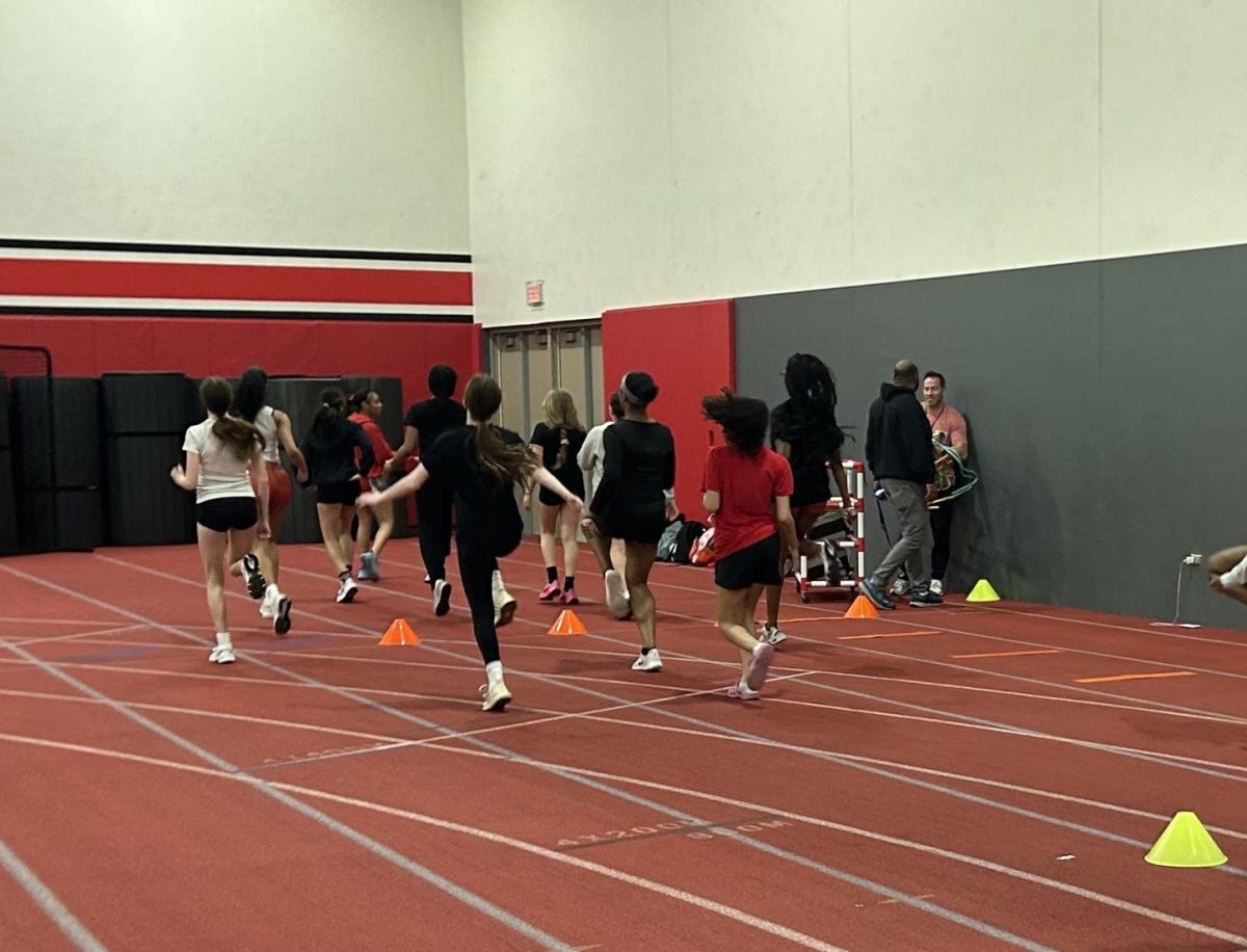 The Bremen Girls track team meets up in the field house March 31 to prepare for their conference meet in mid-May by starting with some preliminary stretches to warm up for practice. They’ll surely go for the WIN at the conference meet!